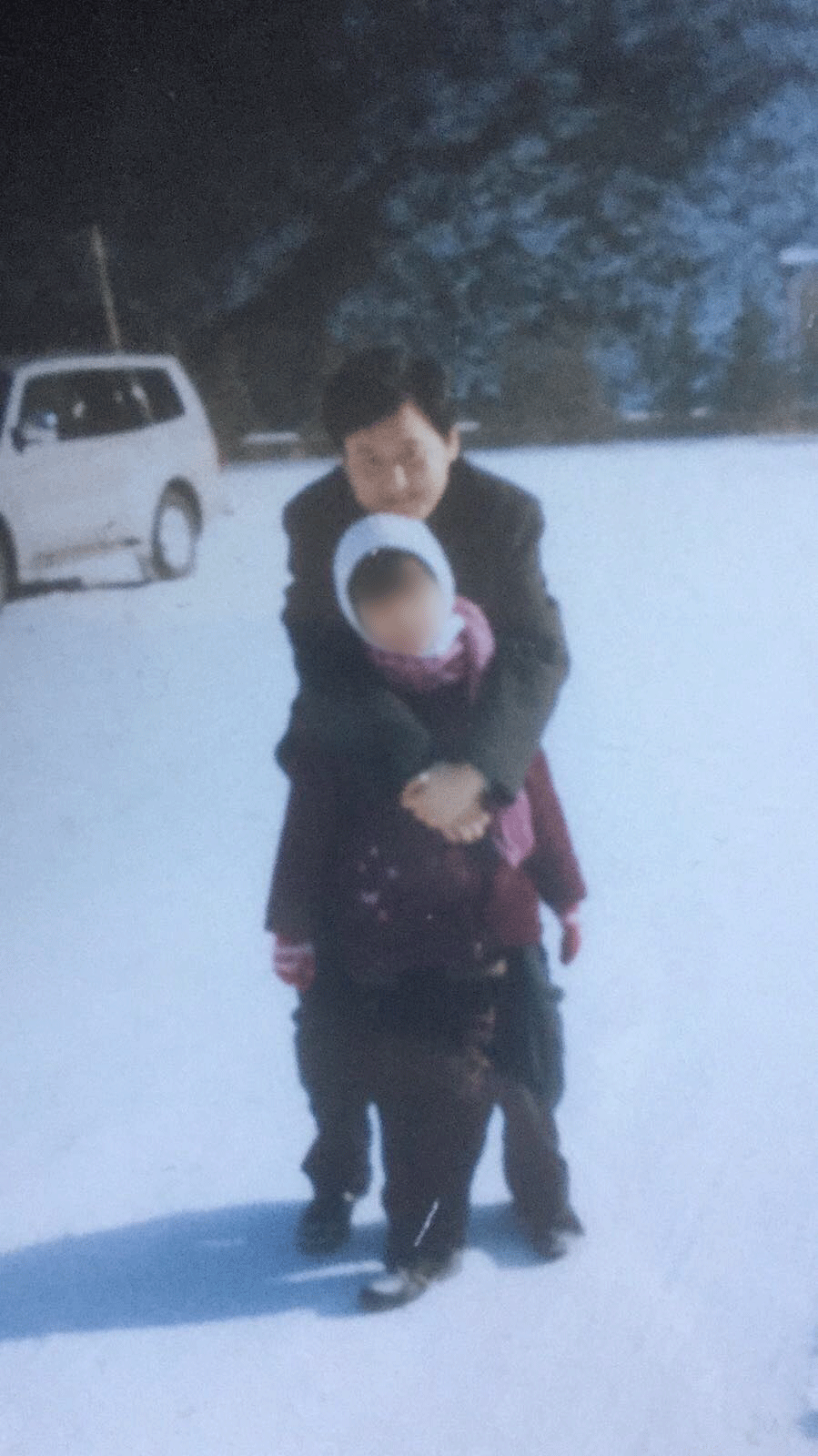 Ma Ju with his daughter in China, before fleeing to Dubai.
