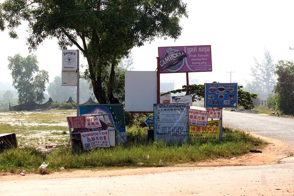 Chinese and Cambodian signage on the edge of town. Photo: RFA