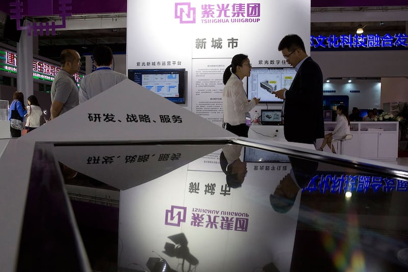 2018 年 5 月 17 日,第 21 届中国北京国际科技产业博览会,紫光集团展台。 (美联社)