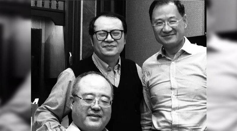 许章润教授与友人合影。(推特图片)