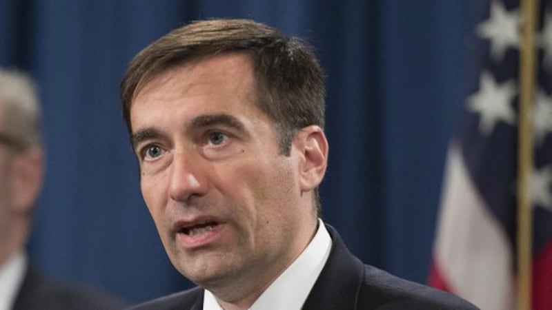 2020年7月21日，美国司法部副部长德默斯（John Demers ）宣布对两名中国黑客提起诉讼。（法新社）