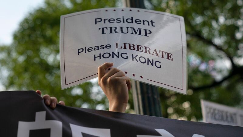 香港反送中团体在日本G20峰会上呼吁国际在G20峰会期间声援香港。（美联社）