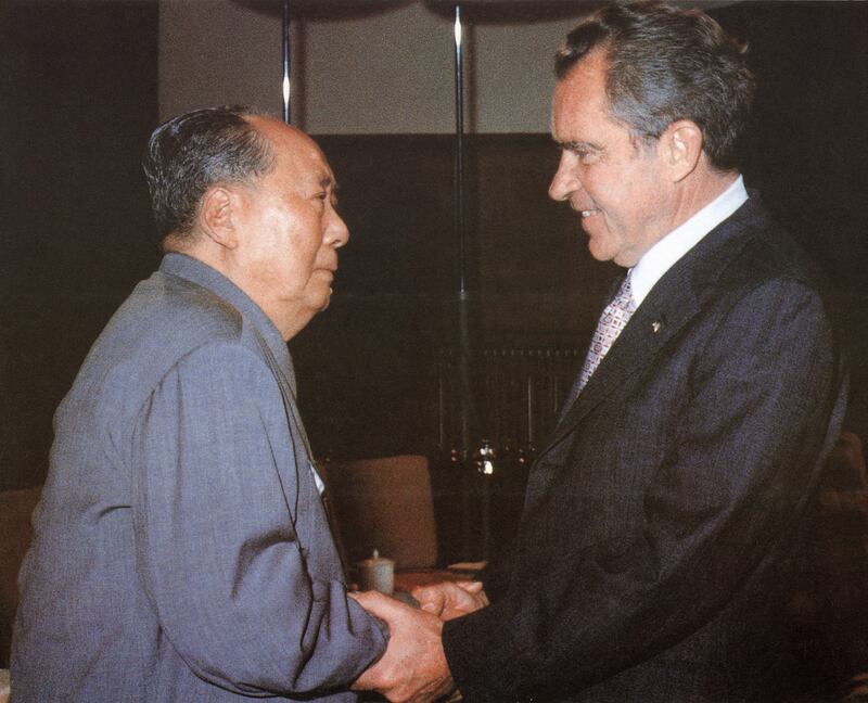 Chinese leader Chairman Mao Zedong welcomes President Richard Nixon in Beijing, Feb. 22, 1972.