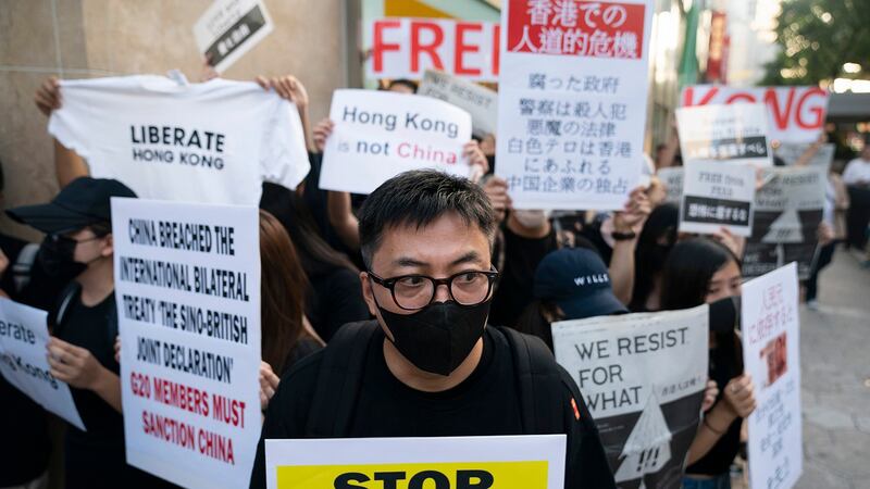 香港反送中团体在日本G20峰会上呼吁国际在G20峰会期间声援香港。（美联社）