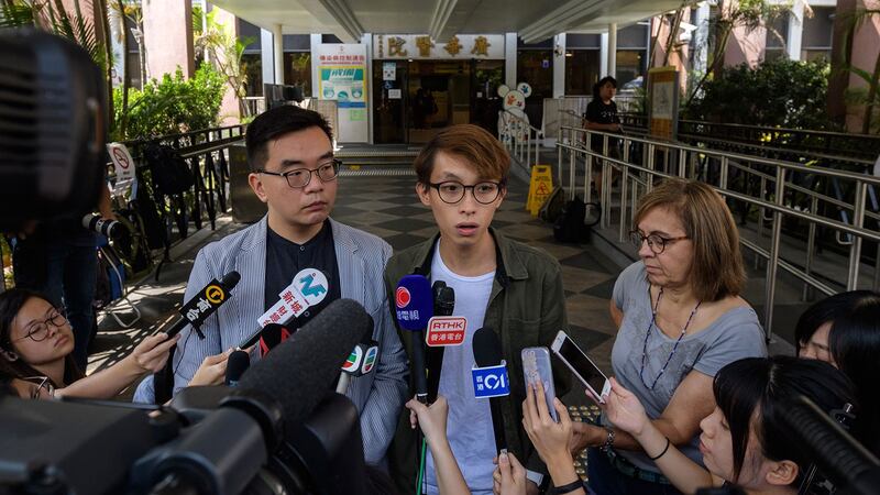 民间人权阵线副召集人黎恩灏<左>。(法新社)