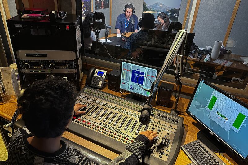 RFA journalists record a podcast at a studio at Radio Free Asia headquarters in Washington, May 23, 2024.