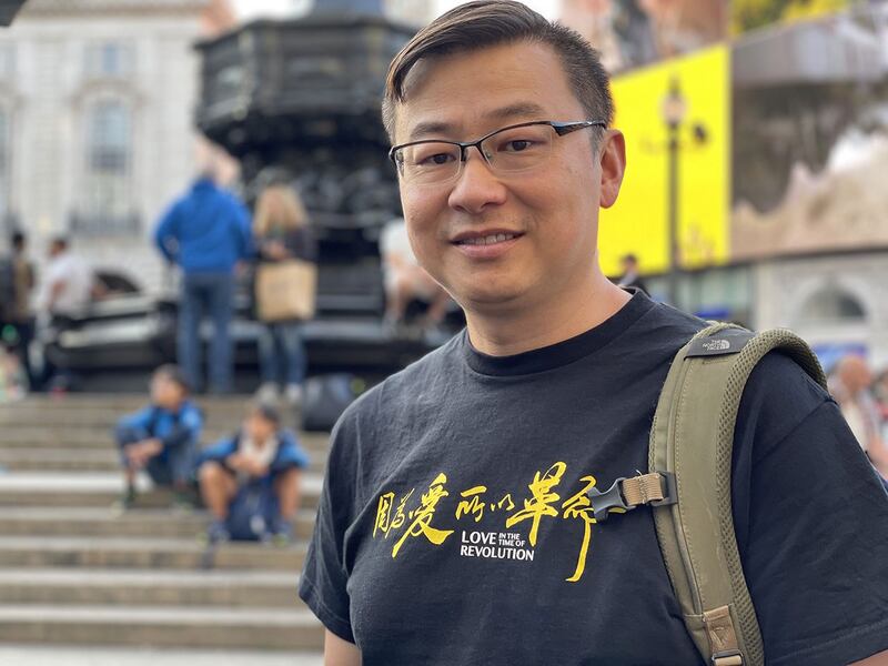 参与伦敦 “7·21”集会的港人梁先生,移民前任职警队以外的香港纪律部队。 (吕熙摄)