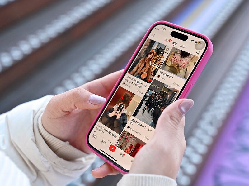 A smartphone displays the Chinese social networking and e-commerce app Xiaohongshu, also known as RedNote, in Beijing on January 15, 2025.