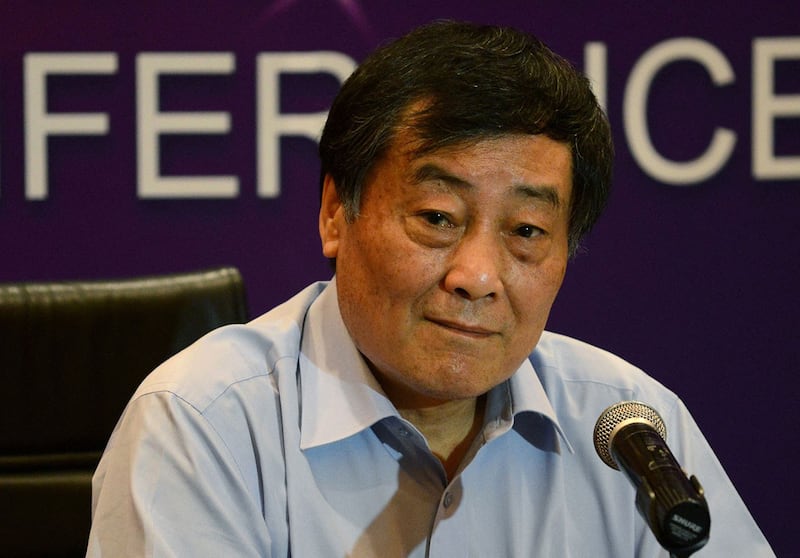 资料照:2013年7月17日,中国食品饮料公司娃哈哈总裁宗庆后在北京出席新闻发布会。(法新社)