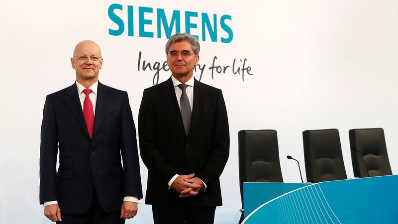 西门子公司总裁Joe Kaeser（右）和首席财务官Ralf P. Thomas。（美联社）